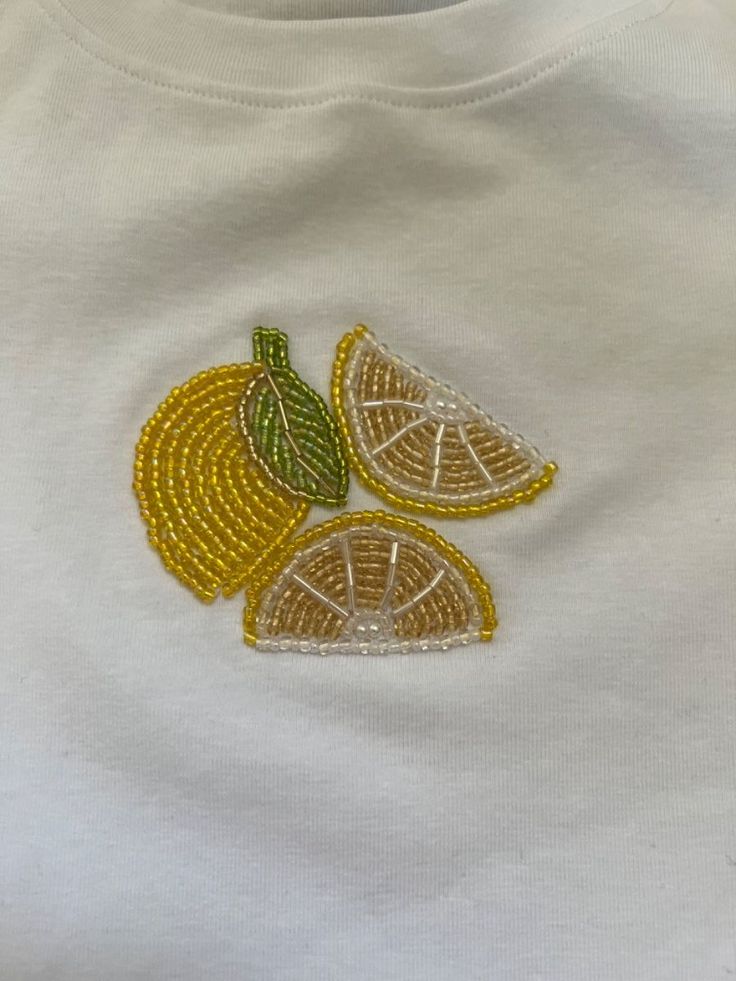 Lemon bead embroidery custom tee Beads Clothes Diy, Lemon Bead Embroidery, Beaded Tops Diy, Bead Embroidery Shirt Ideas, Embroidery Tee Shirts, Diy Beaded Embroidery, Summer Embroidery Designs Shirts, Embroider T Shirt, Beaded Shirt Design