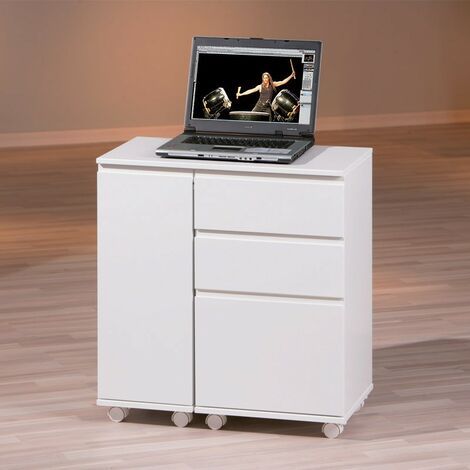 a laptop computer sitting on top of a white cabinet