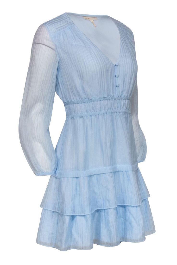 This Maje light blue mini dress showcases delicate ruffles and pleated tiers that flow with your movements, creating a dream-like aesthetic that's difficult to ignore while the deep v-neckline and elastic cuff long sleeves elevate the elegant appeal of this lightweight plain woven fabric. Ideal for garden parties or weddings, pair with sandals & a standout necklace for a fairy tale-inspired look. Size 2 (FR 34) Shell 64% Lyocell 36% Polyamide Lining 100% Viscose Pleated throughout Tiered ruffle Light Blue Mini Dress, French Girl Chic, Tiered Ruffle Skirt, Buy Shoes Online, Garden Parties, Blue Mini Dress, French Girl, Ruffle Skirt, Fairy Tale