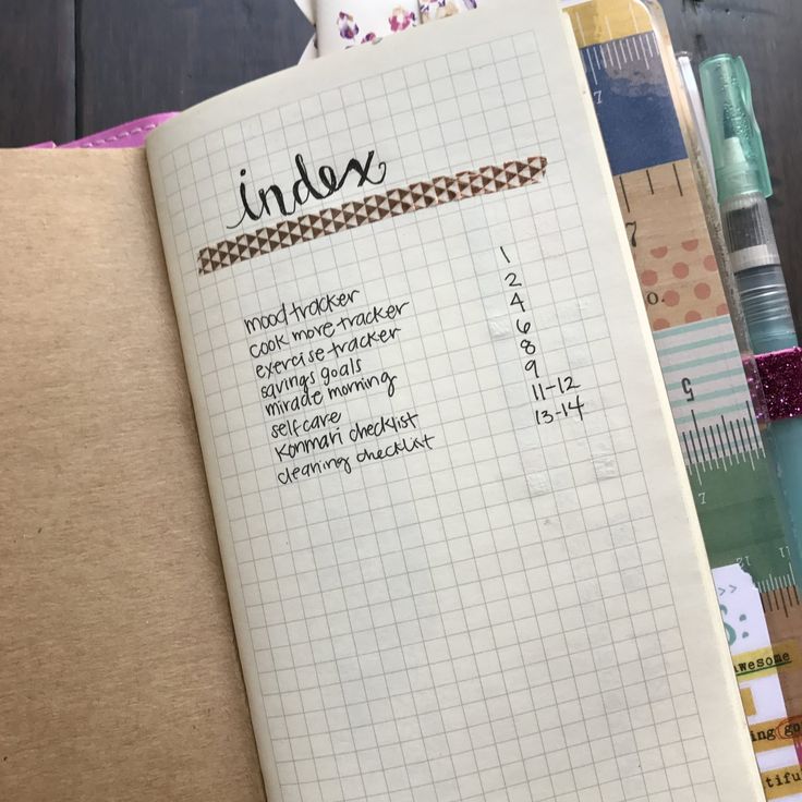 an open notebook with some writing on it