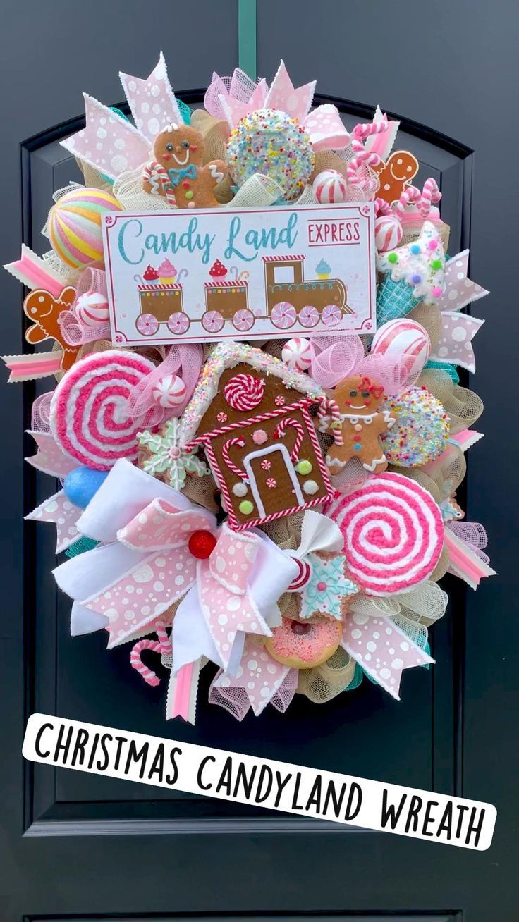 a wreath with candy land express's christmas candyland wreath on the front door