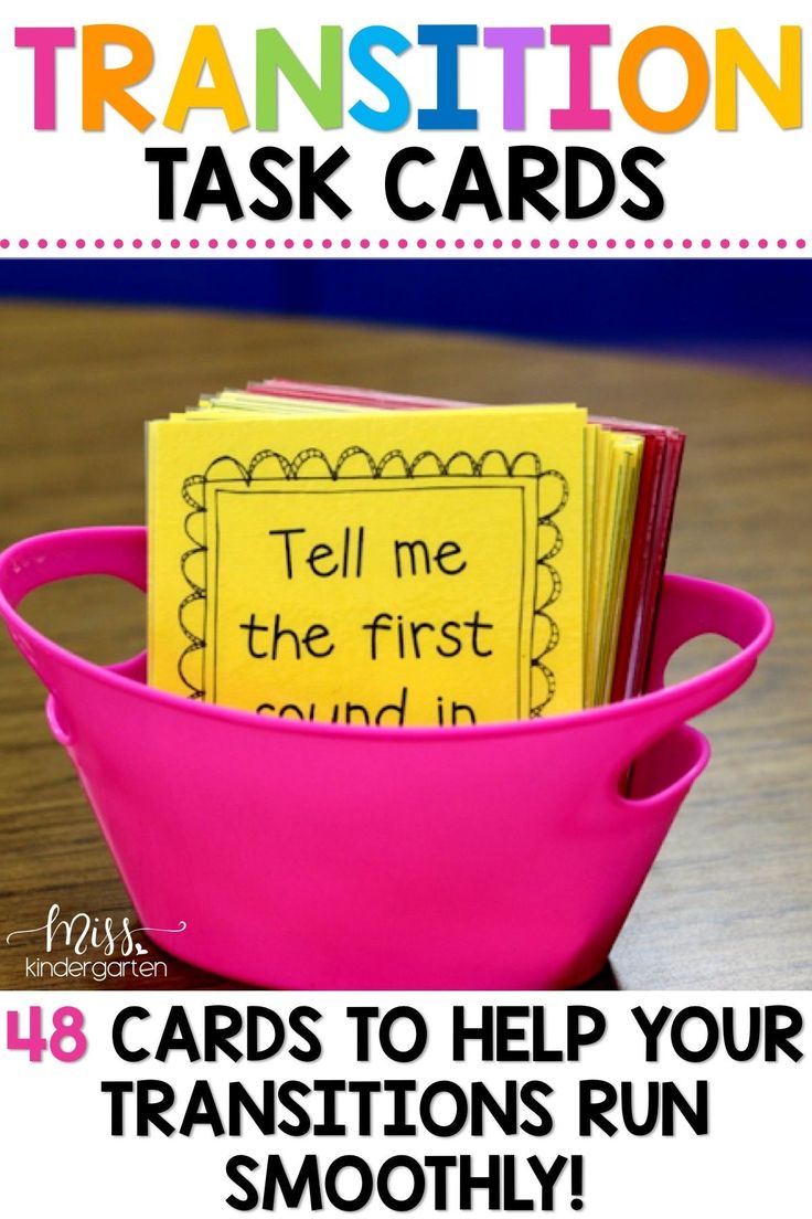 a pink bowl filled with cards on top of a wooden table next to text that reads transition