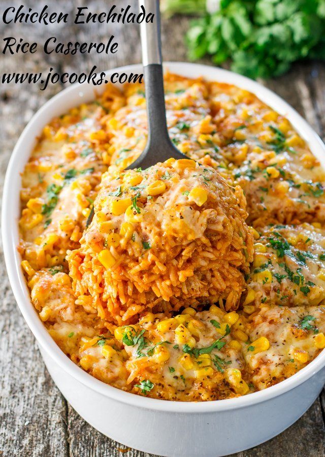 chicken enchilada rice casserole with carrots and rice in it