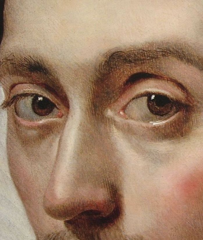 a close up of a painting of a man's face