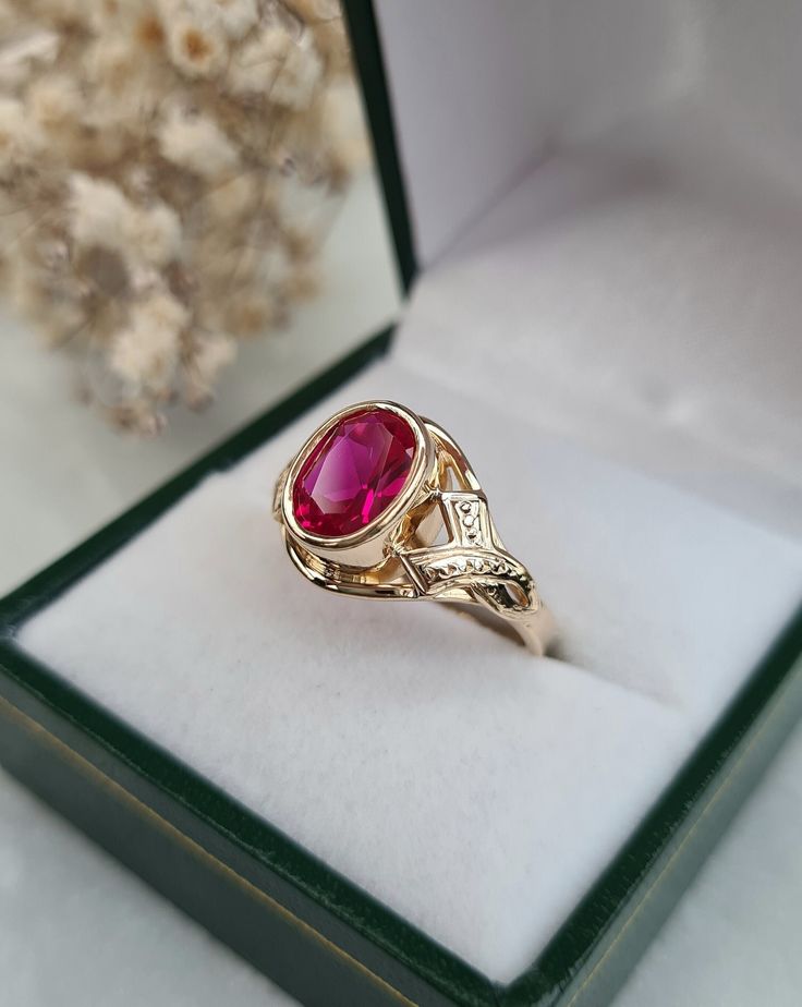 Vintage ring in 18-carat yellow gold set with a synthetic ruby of approximately 1.90 carats. Hallmarks present. Dimensions of the Ruby: 8.55 x 6.50 mm Weight: 4.55 g Size 55.5 - US size 7.25 (Resizing possible, not made by the store) Delivered with certificate invoice. Sending in a tracked and secure package. Do not hesitate to contact me if necessary! Shop link: https://www.etsy.com/fr/shop/EtoileGrenat?ref=seller-platform-mcnav Formal Ruby Signet Ring In Fine Jewelry Style, Fine Jewelry Ruby Signet Ring For Formal Occasions, Ruby Signet Ring For Formal Occasions, Ruby Signet Ring Fine Jewelry For Formal Events, Formal Ruby Ring, Formal Yellow Gold Ruby Solitaire Ring, Formal Solitaire Ruby Ring In Yellow Gold, Yellow Gold Solitaire Ruby Rings, Yellow Gold Ruby Signet Ring For Anniversary