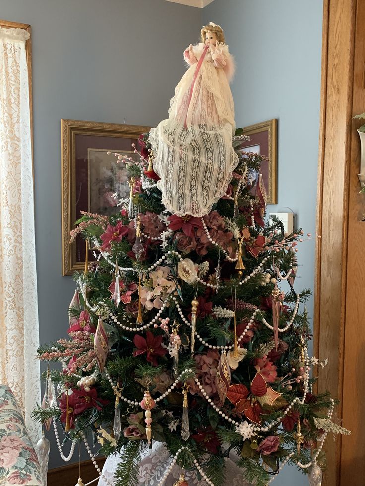 a decorated christmas tree in a living room