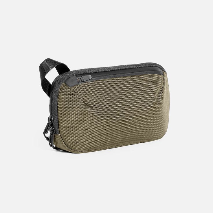 Slim Pouch - Olive — Aer | Modern gym bags, travel backpacks and laptop backpacks designed for city travel Functional Travel Accessories With Pockets For On-the-go, Practical Rectangular Travel Accessories With Zipper, Practical Rectangular Travel Accessories With Zipper Pocket, Functional Pouch Bag With Pockets, Functional Rectangular Pouch For On-the-go, Modern Travel Accessories With Zipper Pocket, Versatile Rectangular Cases With Zipper Pocket, Versatile Rectangular Case With Zipper Pocket, Multifunctional Everyday Travel Accessories With Pockets