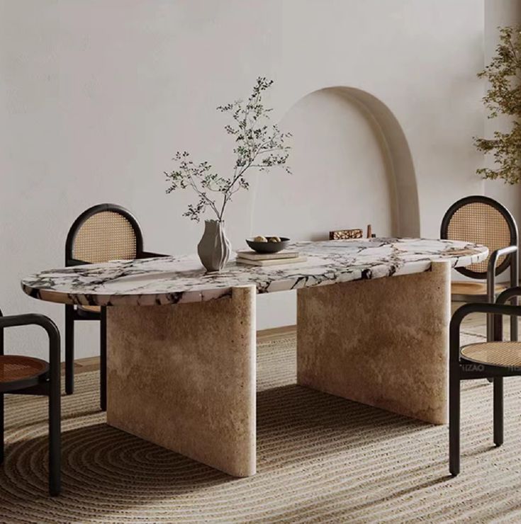 a marble table with chairs around it