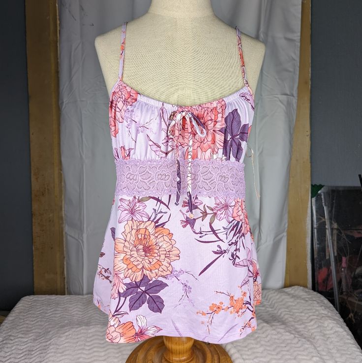 New With Tags Lovely, Silky Soft Cami With Adjustable Straps Beautiful Purples With Lace Overlay Band In Front Measurements Available Upon Request Offers Welcome! Purple Cami Sleepwear For Summer, Floral Print Lavender Top For Vacation, Lavender Floral Print Top For Vacation, Purple Tank Top With Built-in Bra For Summer, Lavender Cotton Sleepwear For Summer, Summer Purple Cotton Sleepwear, Fitted Cami Sleepwear For Vacation, Purple Summer Camisole Sleepwear, Summer Purple Camisole Sleepwear