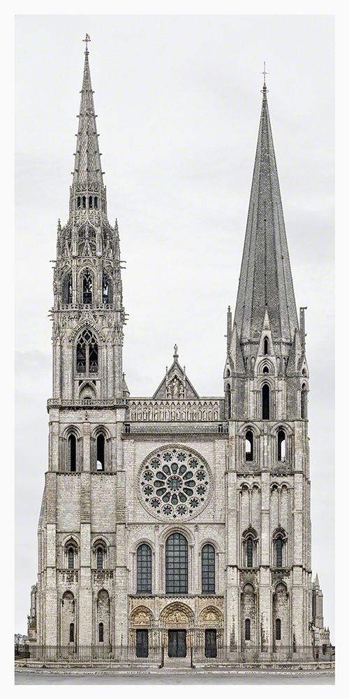 the large cathedral has two spires on it's sides and is very ornate