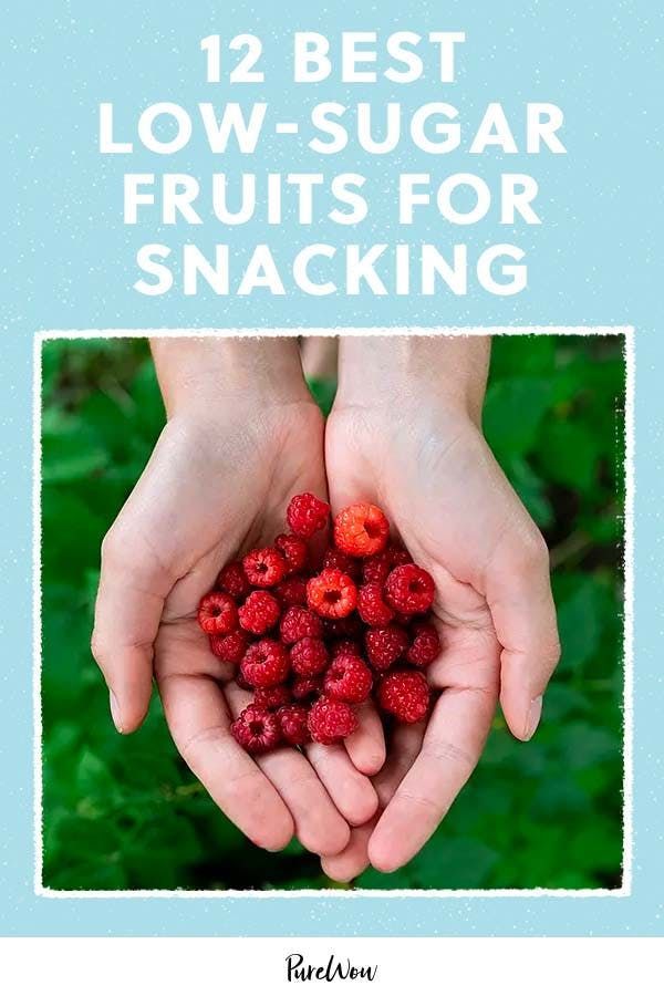 two hands holding raspberries with the words 12 best low - sugar fruits for snacking