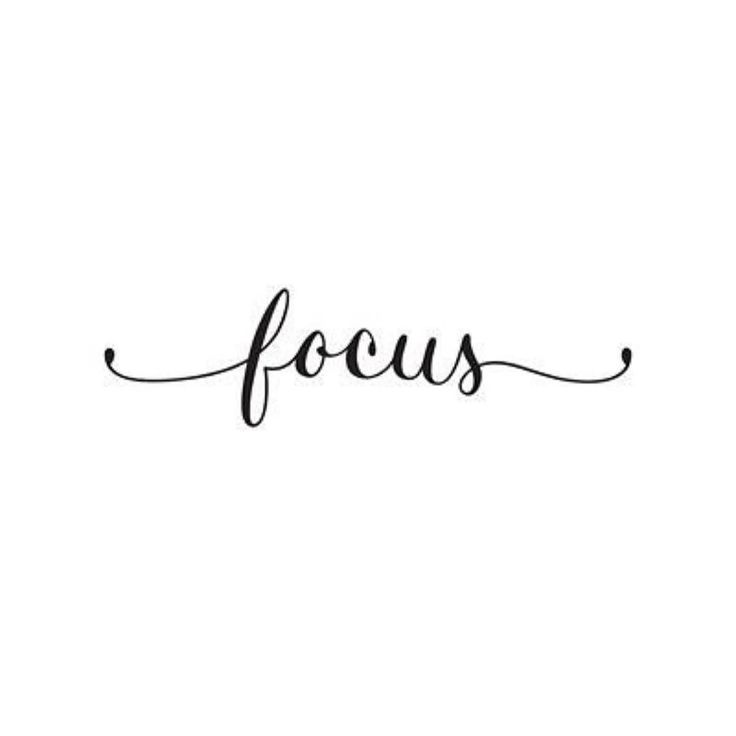 the word focus is written in cursive writing on a white background with black ink