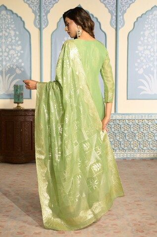 Light green tissue kurta featuring with sequins and mirror work on placket and all-over floral woven motifs. Comes with heavy Banarasi bordered dupatta and matching pant. - Aza Fashions Green Art Silk Churidar With Gota Work, Green Slub Silk Churidar For Transitional Season, Transitional Green Slub Silk Churidar, Green Tissue Silk Churidar With Traditional Drape, Pista Green Tissue Silk Kurta For Diwali, Festive Green Tissue Silk Kurta, Green Tissue Silk Kurta With Zari Work, Unstitched Green Tissue Silk Kurta, Green Traditional Wear With Gota Work In Tissue Silk