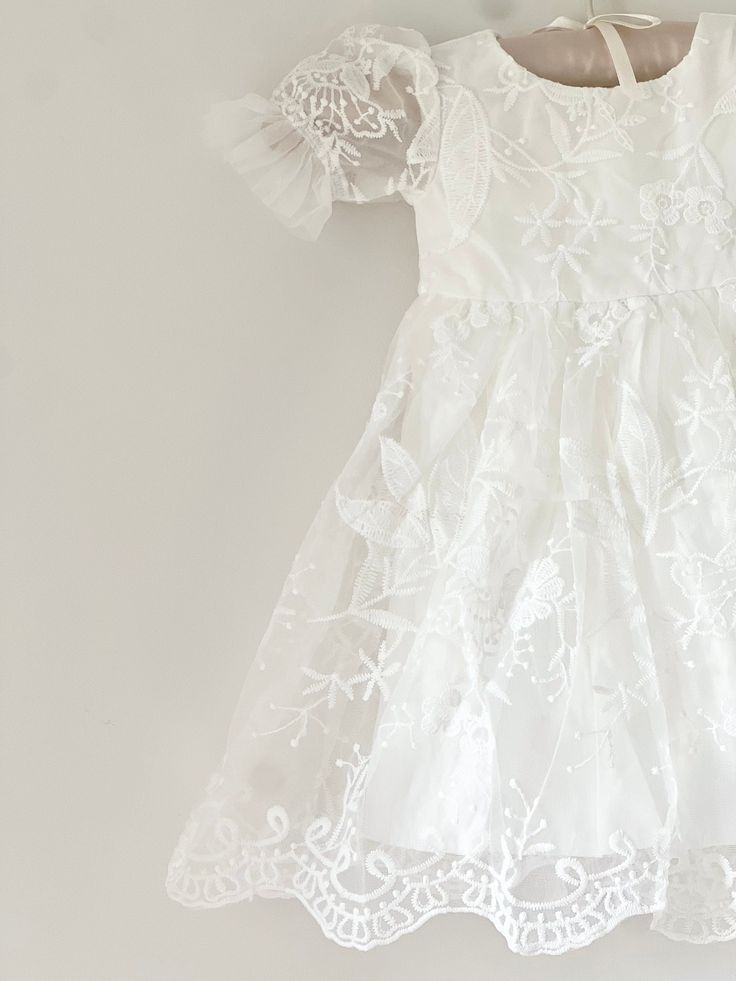 A timeless heirloom, our gorgeously made vintage inspired gown is perfect for your little's special event. Featuring delicate lace, made perfect with a cotton/linen liner to ensure comfort. This is a complete set consisting of the gown and coordinating bonnet. White Ruffled Princess Dress For Garden Party, Elegant Short Sleeve Tulle Baptism Dress, White First Communion Gown For Spring, White Baptism Dress For Spring Garden Party, Elegant Princess Dress For Garden Party, Elegant White Princess Dress For Garden Party, White Gown For First Communion In Spring, Princess Style Baptism Dress For First Communion In Spring, Spring Confirmation Princess Dress With Ruffles