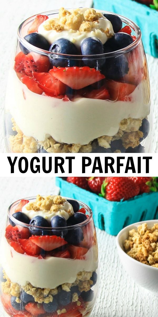 yogurt parfait with berries and blueberries in it on a table