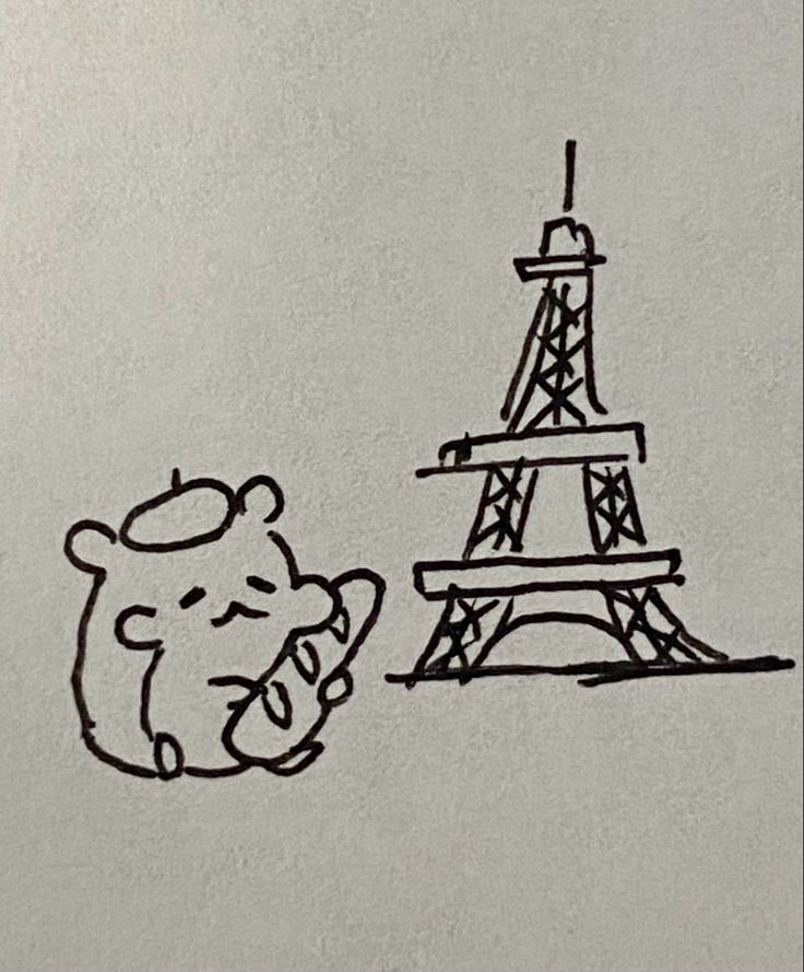 a drawing of a teddy bear sitting in front of the eiffel tower