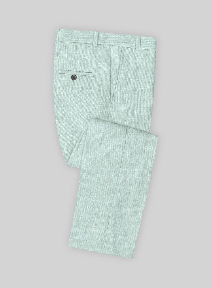 Mint adds a refreshing touch to any outfit, and our Italian Linen Mint Green Pants allow you to incorporate this color from head to toe for a cool and stylish look. Crafted from pure, lightweight, soft, and breathable linen, these striking pants boast a solid texture and a pastel mint green hue with subtle hints of blue, making you stand out on any occasion, from a summer wedding to a horse racing event.   Look Includes   Italian Linen Mint Green Fabric  Cross Pocket  Flat Front  Two Welted Bac Summer Solid Dress Pants With Welt Pockets, Solid Summer Dress Pants With Welt Pockets, Tailored Summer Dress Pants With Pockets, Summer Tailored Dress Pants With Pockets, Tailored Dress Pants With Pockets For Summer, Tailored Solid Pants For Summer, Green Dress Pants With Welt Pockets For Spring, Summer Cotton Dress Pants, Linen Dress Pants Trousers For Summer