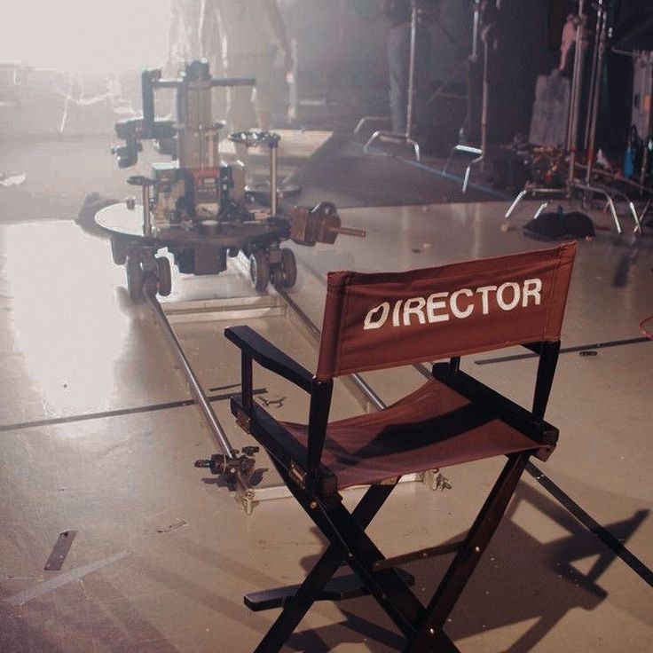 a director's chair sitting in front of a camera