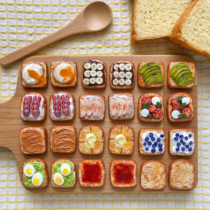 a wooden tray with different types of food on it