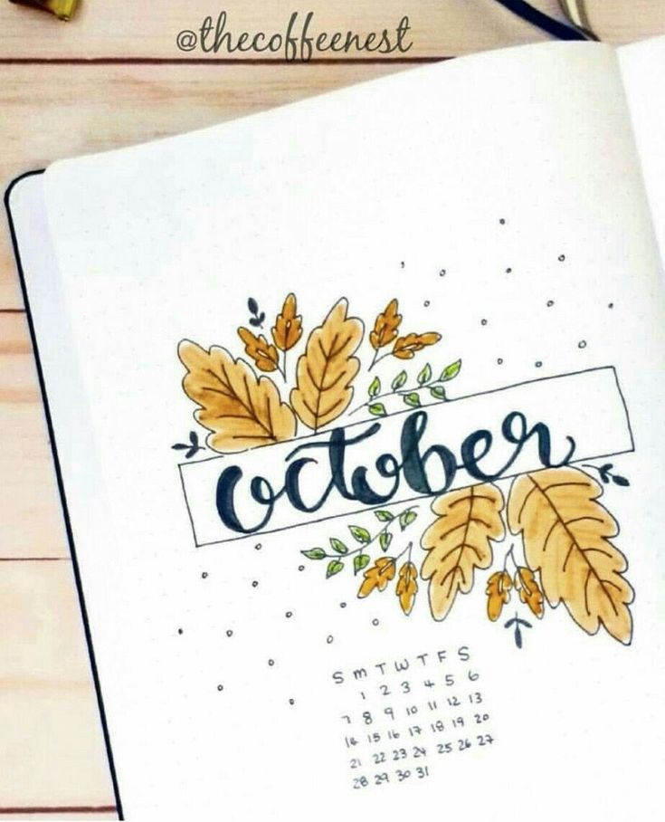 an open notebook with the word october written on it