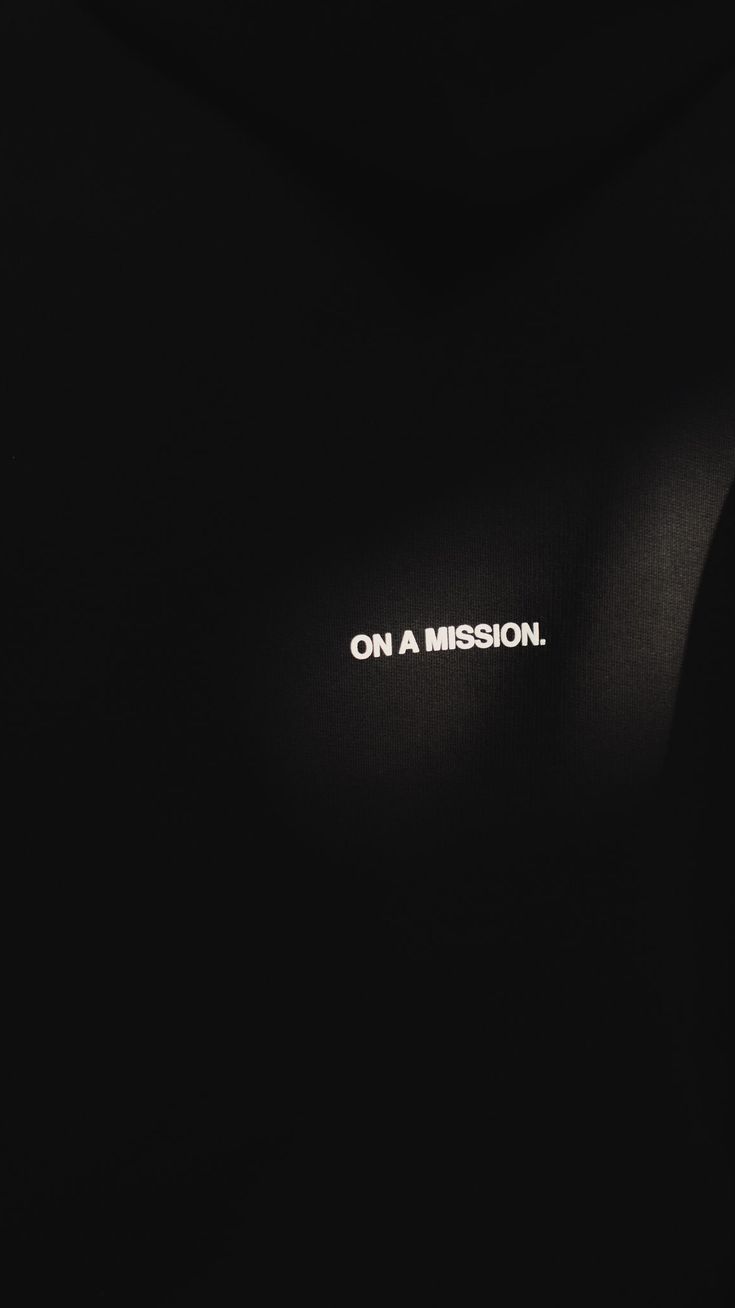 the word on a mission written in white light against a black background with no image