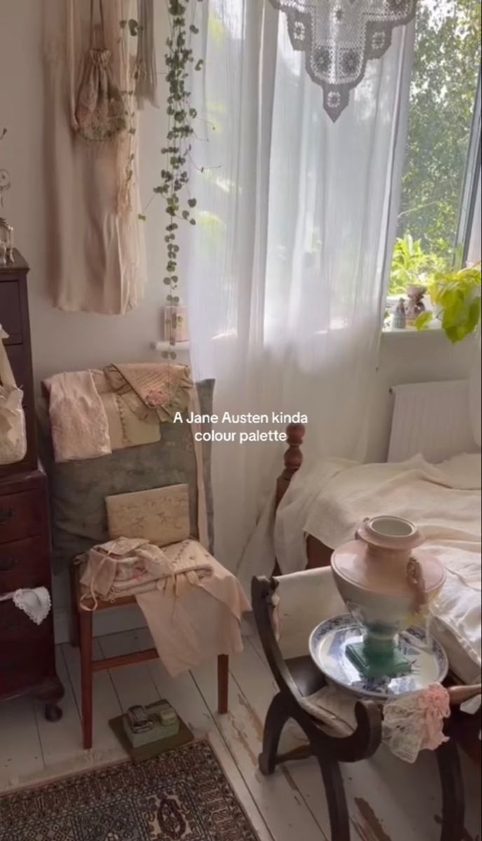 an old fashioned bedroom with antique furniture and curtains on the window sill, next to a bed