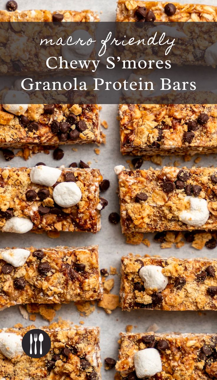 granola protein bars with chocolate chips and marshmallows on top, arranged in rows