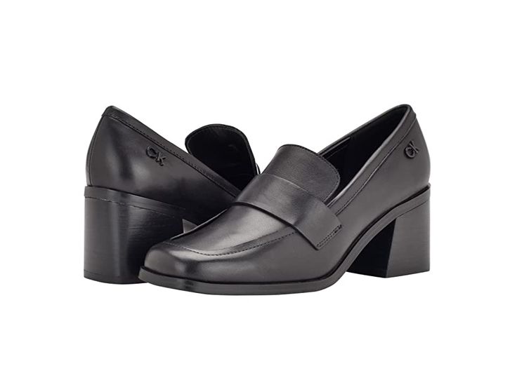 Calvin Klein Ventice - Women's Shoes : Black : Steal all the compliments at your formal event by wearing the Calvin Klein Ventice loafers. Leather upper. Man-made lining. Easy slip-on style. Strap detailing on the foot. Closed, square toe silhouette. Brand initials embossed on the heel counter. Chunky block heel. Durable man-made outsole. Imported. Measurements: Heel height: 2.6 in. Weight of footwear is based on a single item, not a pair. Elegant Slip-on Loafers With Reinforced Heel, Modern Formal Loafers With Reinforced Heel, Elegant Loafers With Block Heel And Reinforced Heel, Elegant Loafers With Reinforced Block Heel, Modern Formal Loafers With Block Heel, Formal Loafers With Padded Heel And Almond Toe, Formal Loafers With Almond Toe And Reinforced Heel, Elegant Square Toe Loafers With Sculpted Heel, Formal Almond Toe Loafers With Padded Heel