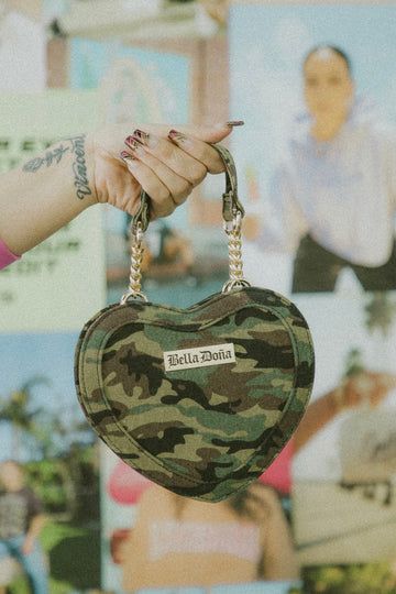 Our custom pink MINI heart shaped handbag is the PERF size to hold all your essentials! Grab your cards, cash, some gloss & you're good to go Bbgirl!  Measures 7.5" x 8" Baddie Pfps Aesthetic, Baddie Pfps, Camo Handbags, Heart Handbag, Camera Purse, Pfps Aesthetic, Camo Bag, Camo Purse, Purse Outfit