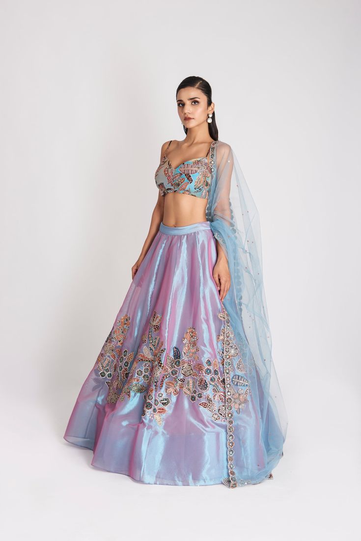 Kinfolk Wisteria blue applique embellished tissue MK lehenga, blouse & tulle dupatta. From Aisha Rao's Kinfolk collection. DELIVERY TIMEPlease allow 6-8 weeks for your outfit to arrive. FABRIC DETAILSTissue Professional cleaning only. Tissue Lehenga, Aisha Rao, Wisteria Blue, Cape Blouse, Tulle Cape, Lehenga Blouse, Designer Dresses Casual, Party Wear Indian Dresses, Indian Clothes