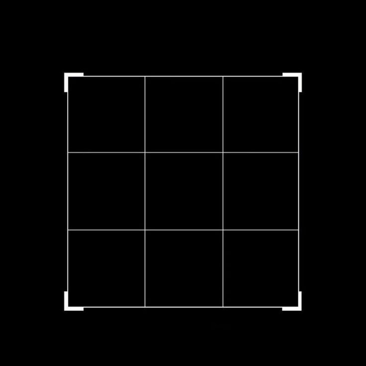 a black and white photo with squares in the middle on a black background that appears to be rectangleed