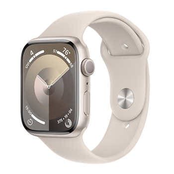 an apple watch with a white band and silver clock on the back of it's face