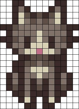 a cross stitch pattern with a cat's face in brown and white squares,