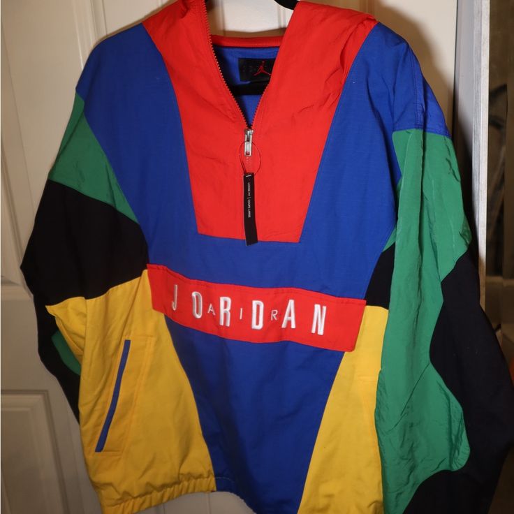 Jordan Multi-Colored Color Blocked Windbreaker Size Men’s Medium But Fits Oversized In The Body. New With Tags! Casual Multicolor Color Block Outerwear, Spring Multicolor Color Block Windbreaker, Multicolor Hooded Windbreaker With Color Block, Multicolor Hooded Color Block Windbreaker, Multicolor Color Block Hooded Windbreaker, Spring Multicolor Patchwork Windbreaker, Sporty Red Outerwear With Patchwork, Sporty Red Patchwork Outerwear, Urban Color Block Long Sleeve Windbreaker