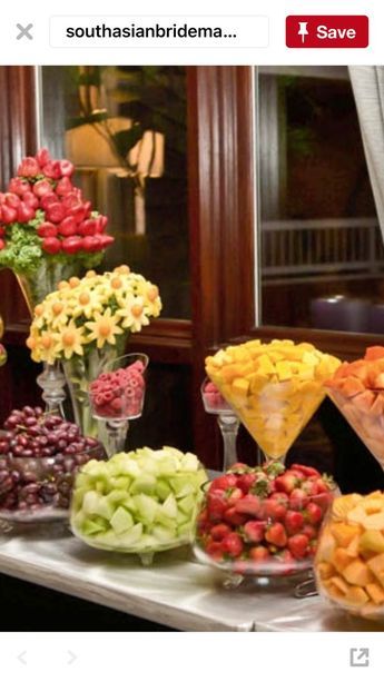 a table topped with lots of different types of fruits and veggies next to each other