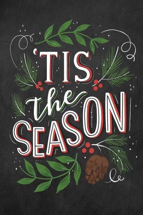 the words tis the season written in chalk on a blackboard with leaves and acorns