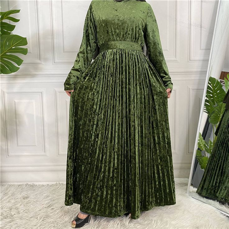 This beautiful pleated velvet dress is the perfect outfit for your next dinner, gathering, or party this fall winter season. Comes in 8 colours just for you. Full sleeve and includes a belt for your styling. Green Velvet Dress For Fall, Green Velvet Fall Dress, Fitted Pleated Maxi Dress For Winter, Elegant Green Velvet Dress For Fall, Green Long-sleeved Velvet Dress, Green Velvet Long Sleeve Formal Dress, Green Long Sleeve Velvet Dress For Formal Occasions, Belted Party Dresses For Winter, Winter Party Dress With Belt