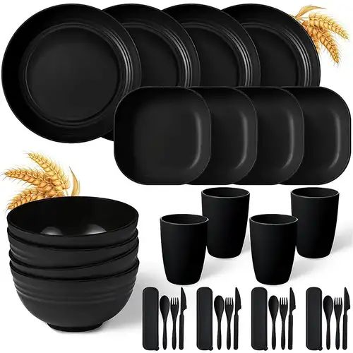 black dinnerware set with forks and spoons