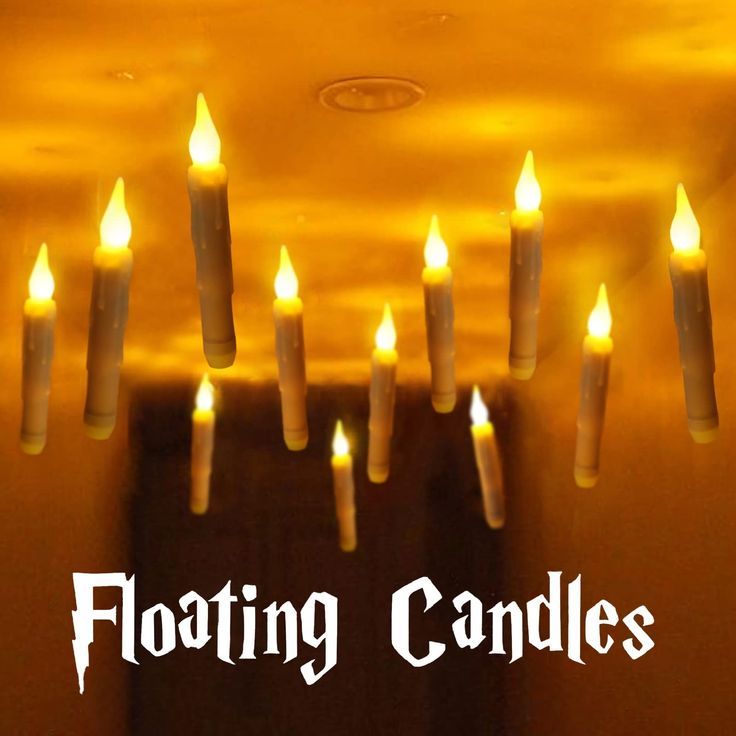 candles floating in the air with words floating candles above them that read, i love you