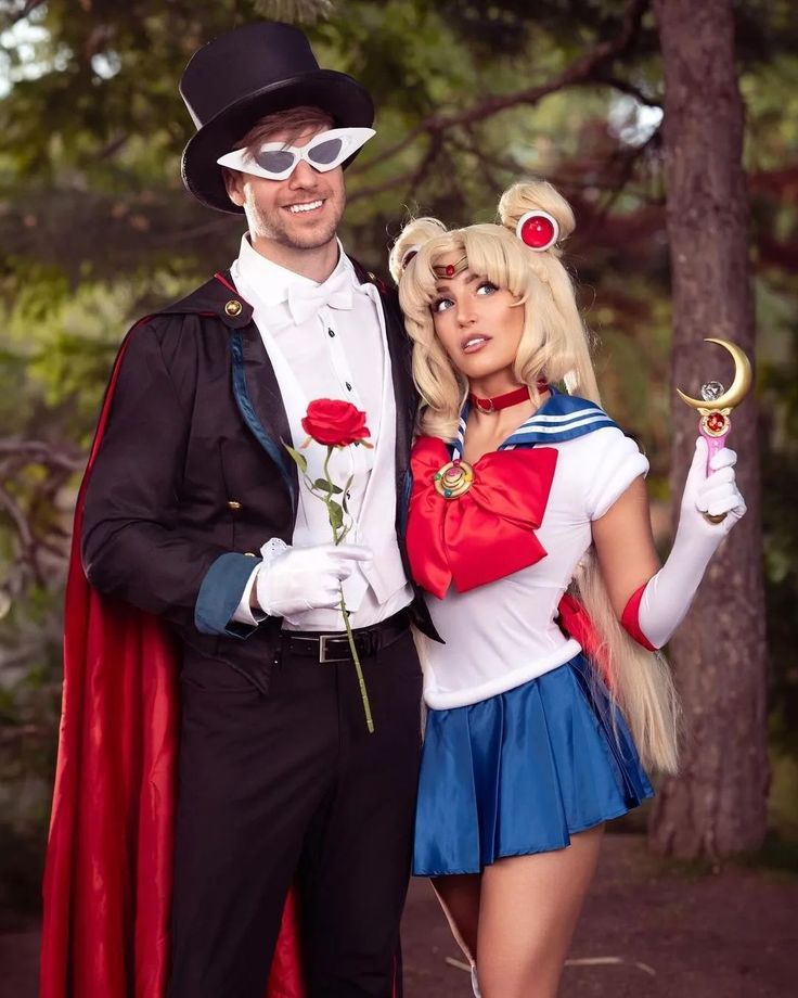 a man and woman dressed up in costumes posing for a photo with one holding a rose