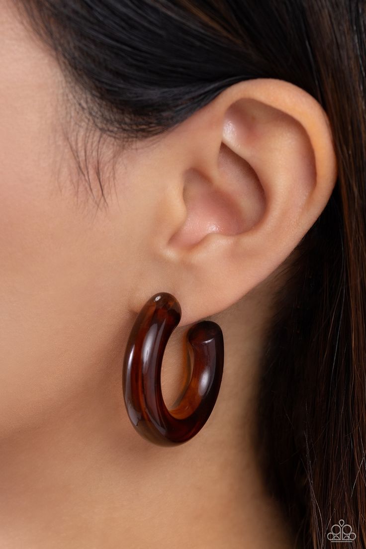 Thick, glossy brown acrylic frames snugly loop and curl just below the ear for a fashionable finish. Earring attaches to a standard post fitting. Hoop measures approximately 1 1/2" in diameter. Sold as one pair of hoop earrings. Ear Cuff Jewelry, Brown Acrylic, Brown Earrings, Mixed Metal Jewelry, Acrylic Frames, Toggle Bracelet, The Ear, Paparazzi Accessories, Paparazzi Jewelry