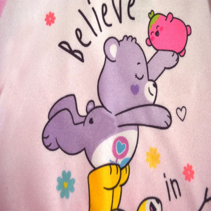 We simply adore these pajamas! These Polyester fleece PJs for girls feature Care Bear favorites Funshine Bear, Grumpy Bear, and Share Bear. The message is a good one too... Believe in Yourself! They are made of flame resistant fabric and are machine wash. Perfect for helping her drift off into dreamland! Cute Long Sleeve Character Print Sleepwear, Cute Long Sleeve Sleepwear With Character Print, Pink Cartoon Print Onesie For Loungewear, Long Sleeve Pink Onesie With Cartoon Print, Pink Long Sleeve Onesie With Cartoon Print, Playful Cartoon Print Onesie For Sleepovers, Playful Pink Onesie For Sleep, Playful Cartoon Print Onesie For Sleep, Pink Character Print Onesie For Playtime