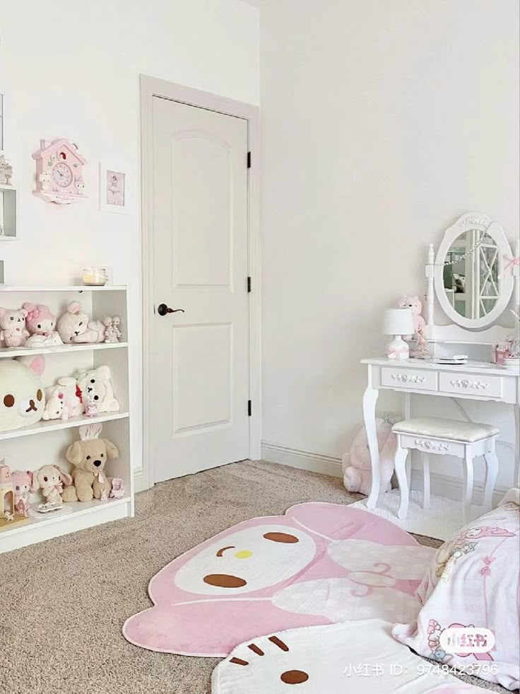 a white room with teddy bears on the floor and pink rugs in front of it