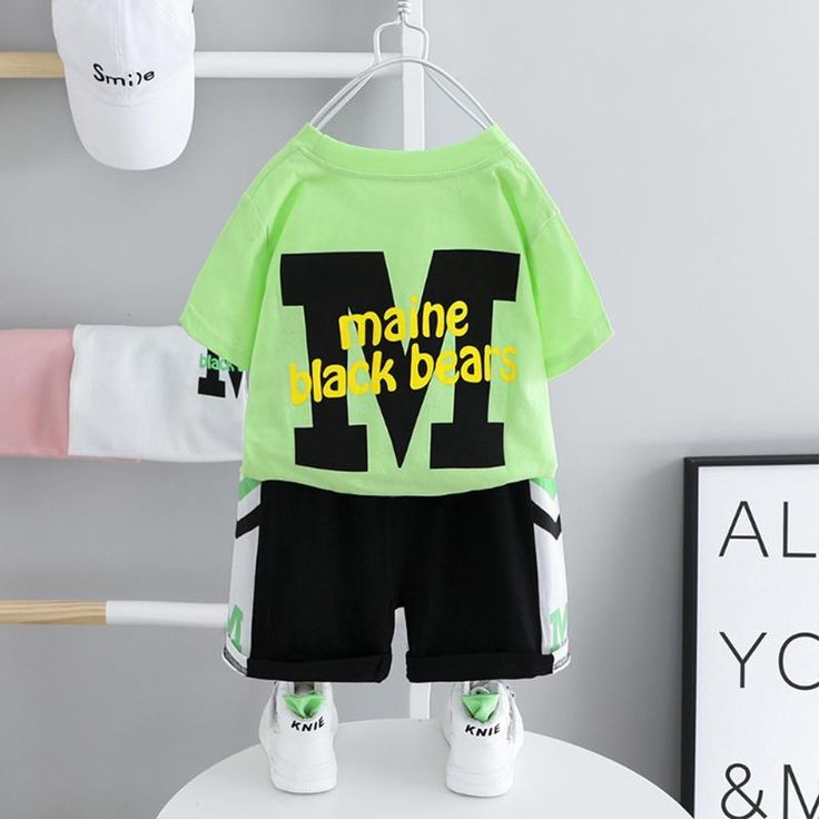 Toddler Boy Letter Print T-shirt & Shorts - PrettyKid White Crew Neck Sets With Cartoon Print, White Crew Neck Set With Cartoon Print, Playful Letter Print Sets With Crew Neck, Crew Neck Cartoon Print Set For Playtime, Cartoon Print Crew Neck Set For Playwear, Cartoon Print Crew Neck Playwear Set, Crew Neck Cartoon Print Playtime Set, Playwear Sets With Cartoon Print And Crew Neck, Casual Cotton Sets With Cartoon Print