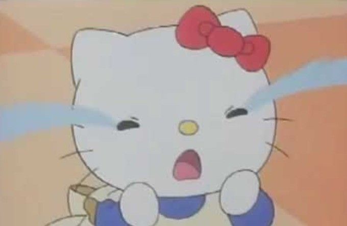 an animated image of a hello kitty with a red bow on her head and chest