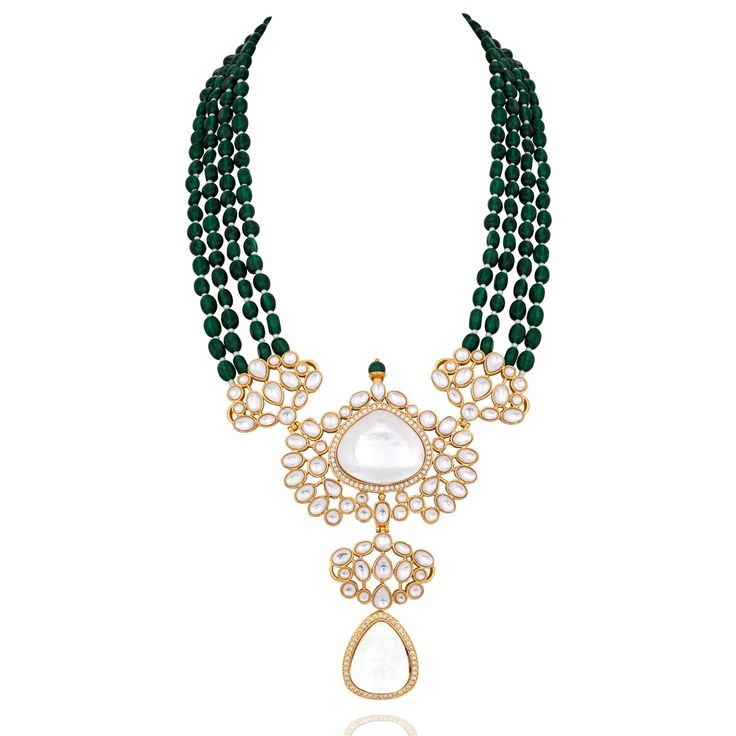 Elegance redefined in every bead - reflecting a dazzling interplay of tradition and contemporary style! Introducing a masterpiece of timeless elegance and modern charm. This stunning jewelry set features luxurious emerald green beads interspersed with delicate white beads, creating a harmonious blend of vibrant hues. Adorned with radiant jadau kundan stones, this mala set is a testament to refined taste and sophisticated allure. The set includes a mala and a pair of matching earrings. Approximat Heritage Jewellery, Green Beads, Waist Chain, Head Accessories, Stunning Jewellery, White Beads, Green Bead, Guinea Bissau, Mozambique