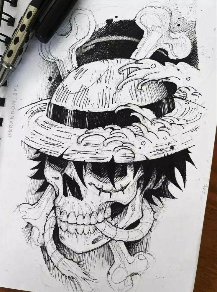 a drawing of a skull with a hat on it's head and some ink