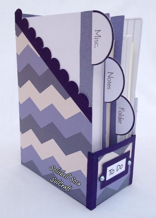 a purple and white box with some sort of folder