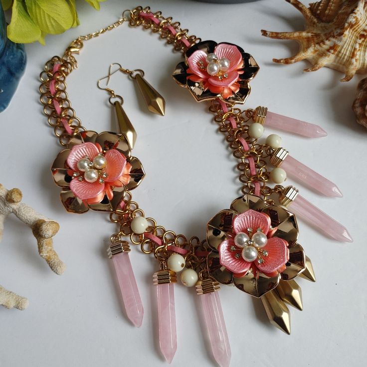 Unique Statement Necklace Set Gold Tone Chain With Gold And Pink Flowers Pearls And Crystals Acrylic Quartz And Gold Accents Matching 2" Acrylic Gold Hook Earrings Necklace Is 17" Plus 3" Extension Chain New 12 Pink Flower Charm Dangle Jewelry, Pink Adjustable Flower Shaped Necklace, Adjustable Pink Flower-shaped Necklace, Adjustable Pink Flower Necklace, Handmade Pink Flower Necklace For Party, Feminine Pink Flower-shaped Jewelry, Pink Flower Pendant Necklace For Jewelry Making, Pink Adjustable Flower Pendant Necklace, Pink Flower Shaped Necklace For Party