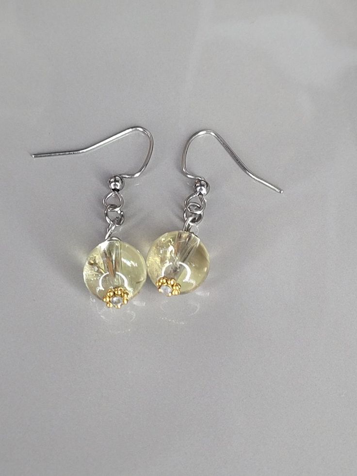 Citrine Drop Earrings With Ear Wire, Citrine Dangle Earrings With Ear Wire, Yellow Dangle Earrings With Lever Back, Clear Round Earrings With Ear Wire, Yellow Nickel-free Drop Flower Earrings, Yellow Dangle Earrings With Ear Wire, Yellow Dangle Earrings For Jewelry Making, Yellow Crystal Earrings As A Gift, Crazy Earrings